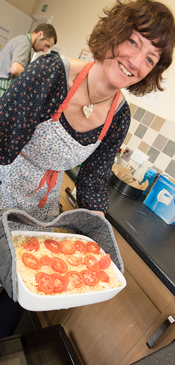 Growing Lives tutor leading a cooking session