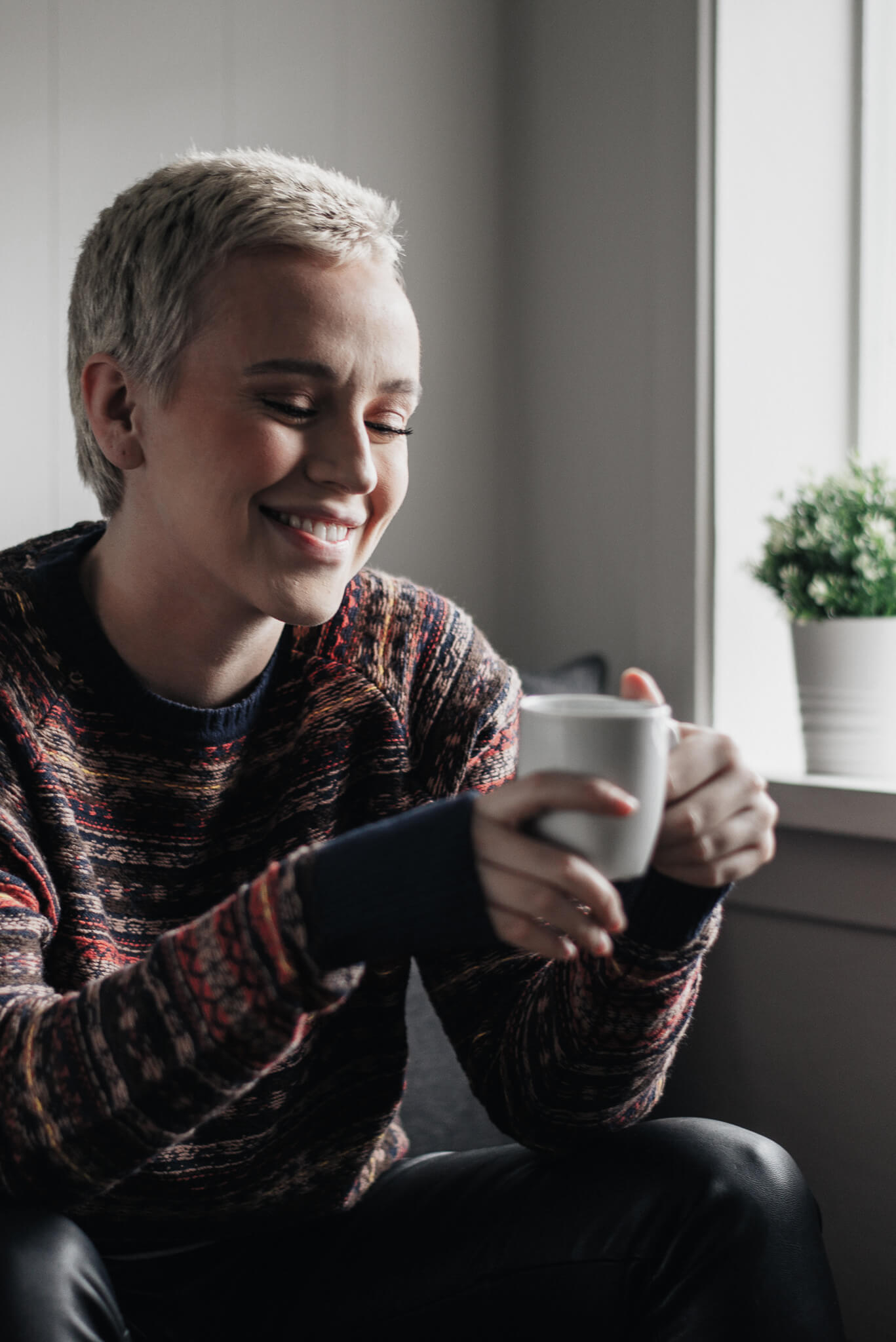 A formerly homeless woman who has been helped to find a home